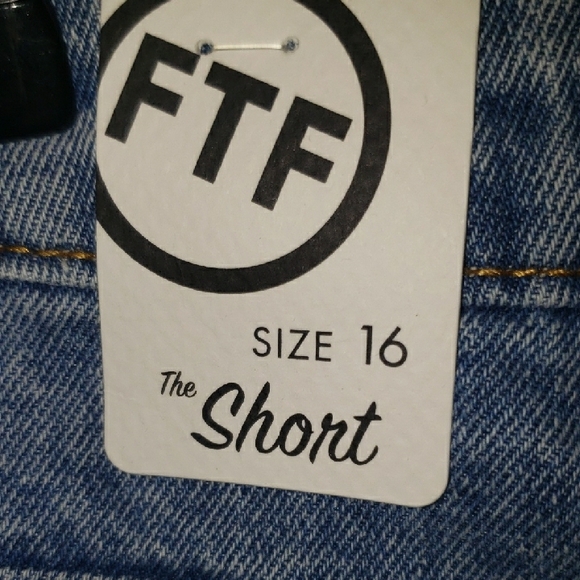 Fashion to Figure Light Blue Distressed Jean Shorts. - Picture 5 of 7